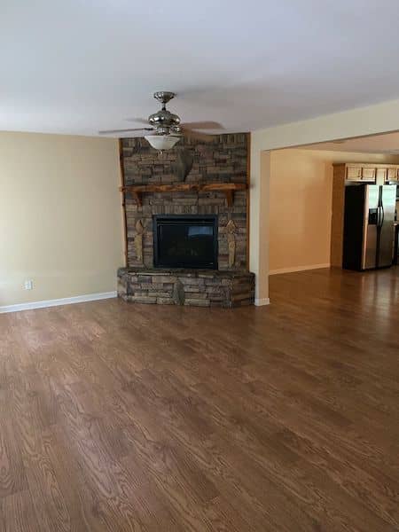 Freshly painted living room with stone fireplace, Blue Ridge, GA
