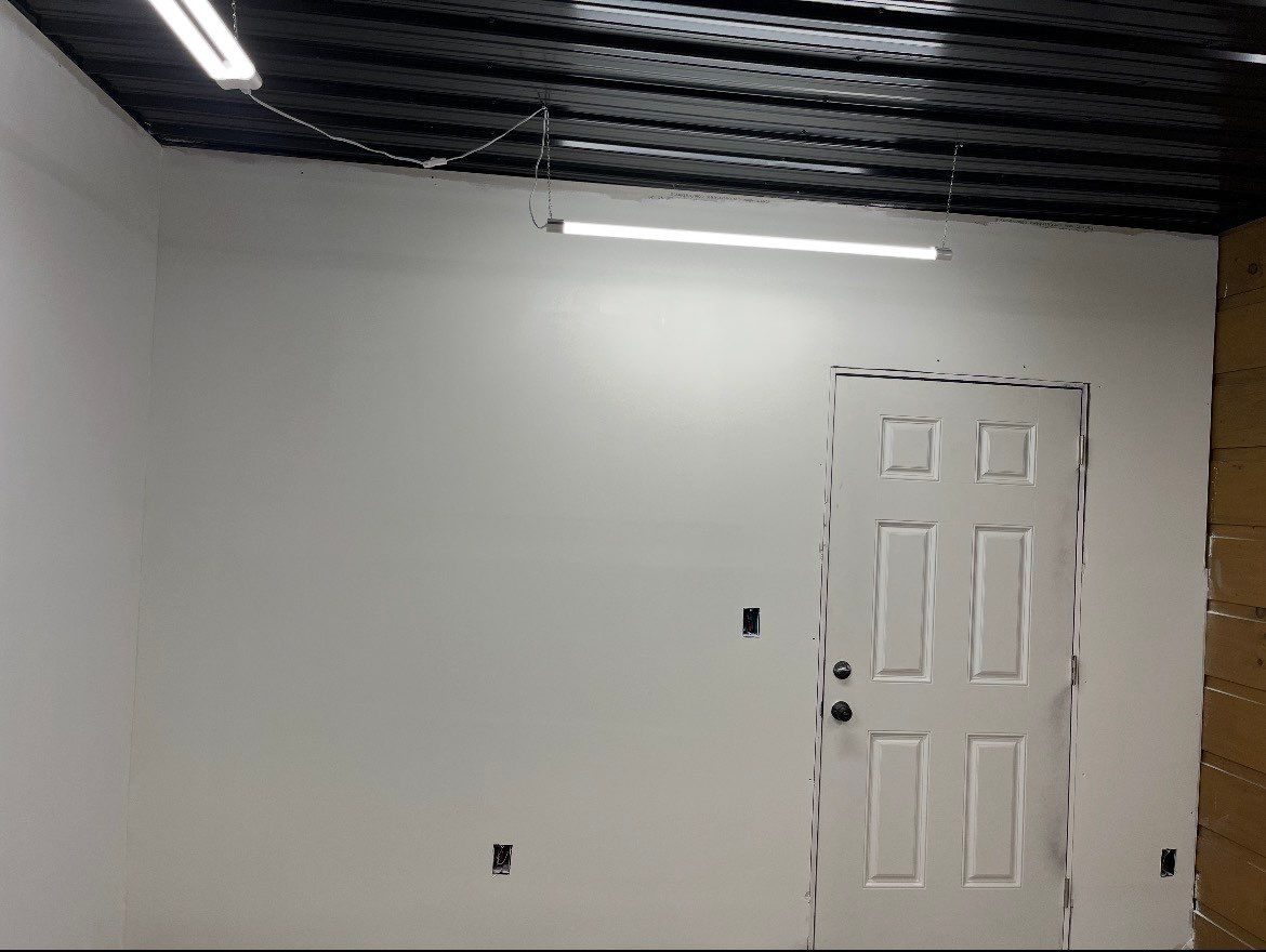 Freshly painted white interior room during a cabin remodel
